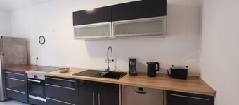 Apartment 'Komfortneubauwohnung Braunsbach' with Mountain View, Shared Terrace and Wi-Fi