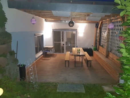 Outdoor dining. Apartment 'Ferienwohnung Balaro Apt I' with Shared Terrace and Wi-Fi