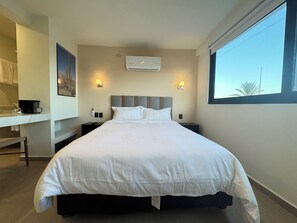 Deluxe Double Room | Pillow-top beds, in-room safe, blackout curtains, iron/ironing board -  Colmena Hotel Los Cabos Marina (Cabo San Lucas)