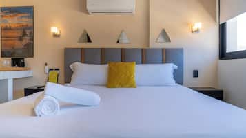 Deluxe Double Room | Pillowtop beds, in-room safe, blackout drapes, iron/ironing board