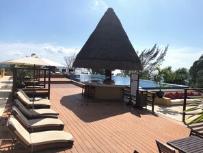 Outdoor pool - 2 BR with infinity adult pool + family pool, ocean view, & best street in Playa! (Playa del Carmen)