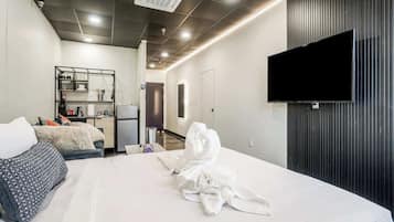 1 dormitorio, tabla de planchar con plancha, cuna de viaje y wifi