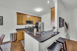 Fridge, microwave, oven, stovetop - Stylish Germantown Home with 3 Bedrooms & 3 Baths | Walk to Nashville’s Best Dining & Coffee Shops | Private Yard with Grill, Smart TVs in Every Room, Driveway Parking for 3, 24 Hr Hospitality (Nashville)