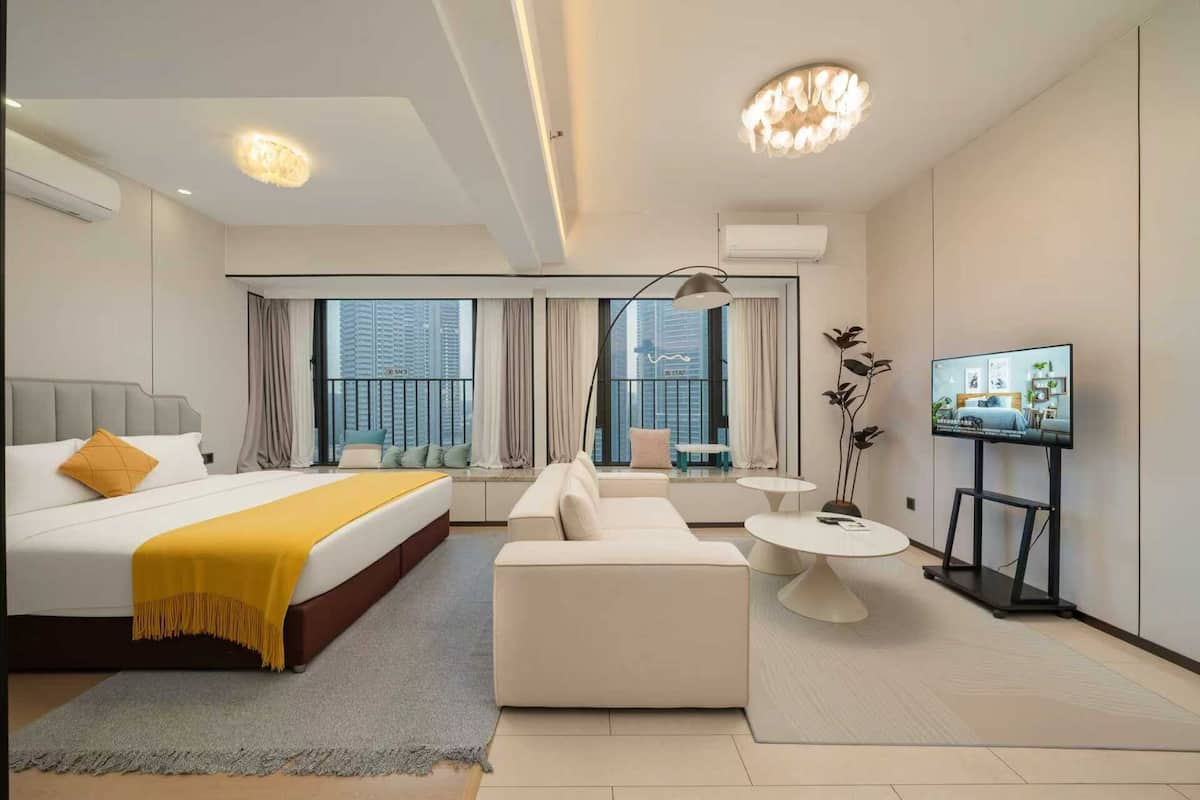 Deluxe suite | Verduisterende gordijnen, een strijkplank/strijkijzer, gratis wifi