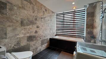 Luxury Apartment, City View | Bathroom | Combined shower/tub, free toiletries, hair dryer, slippers