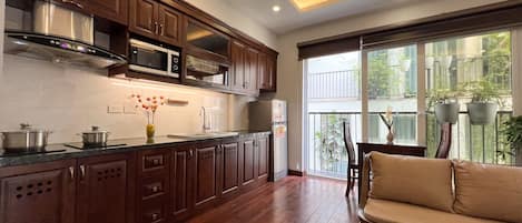 Fridge, stovetop, cookware/dishes/utensils