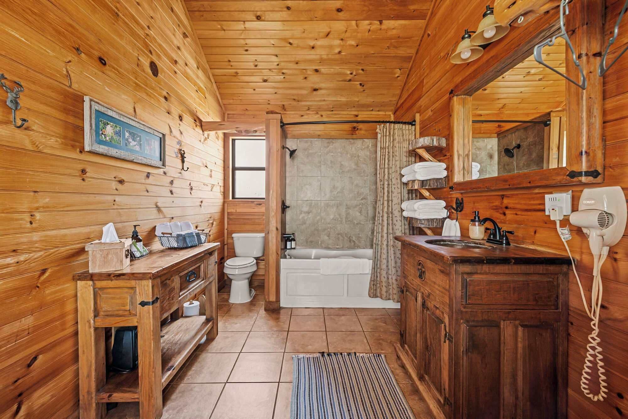 Shower, hair dryer, towels, shampoo