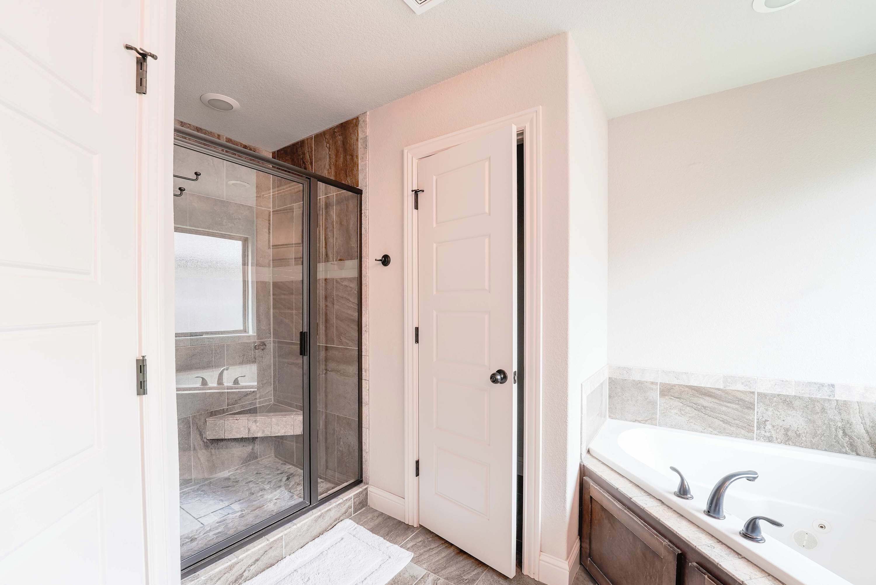 Shower, hair dryer, towels, shampoo
