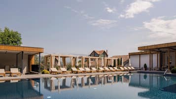Outdoor pool, open 9:00 AM to 9:00 PM, pool umbrellas, sun loungers