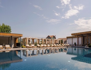 Outdoor pool, pool umbrellas, sun loungers
