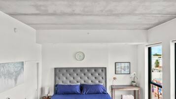 1 bedroom, desk, iron/ironing board, travel crib