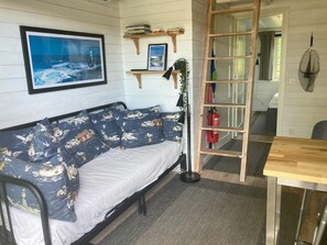 Family Cabin, Sea View | Living area | Flat-screen TV