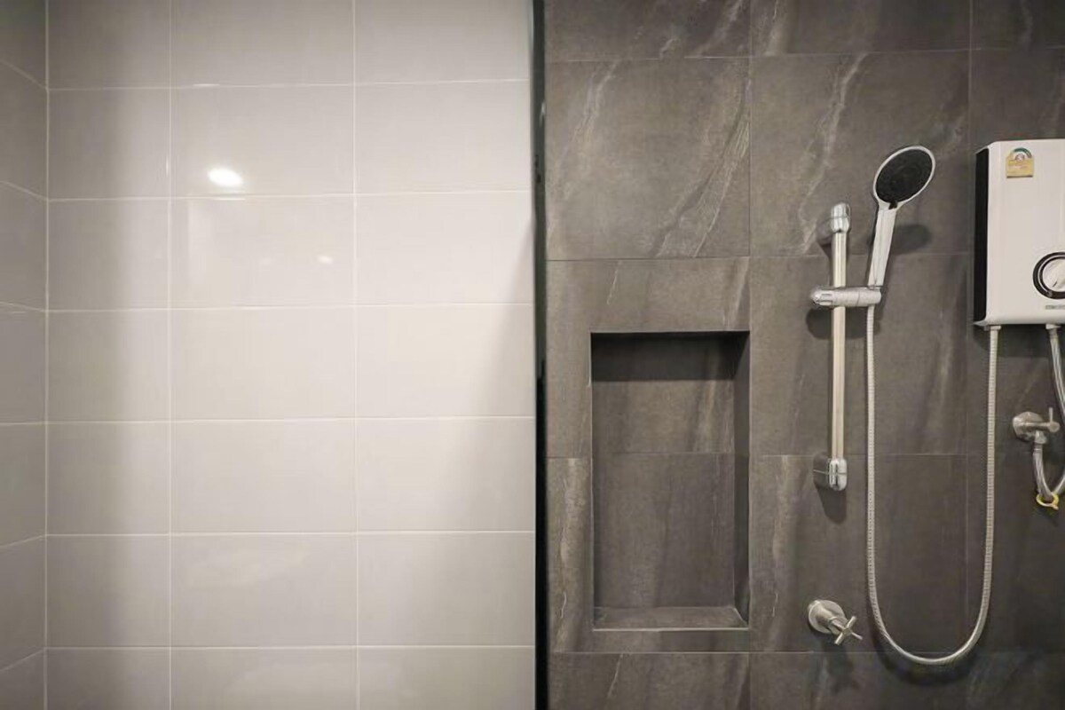 Bathroom | Shower, free toiletries, hair dryer, slippers