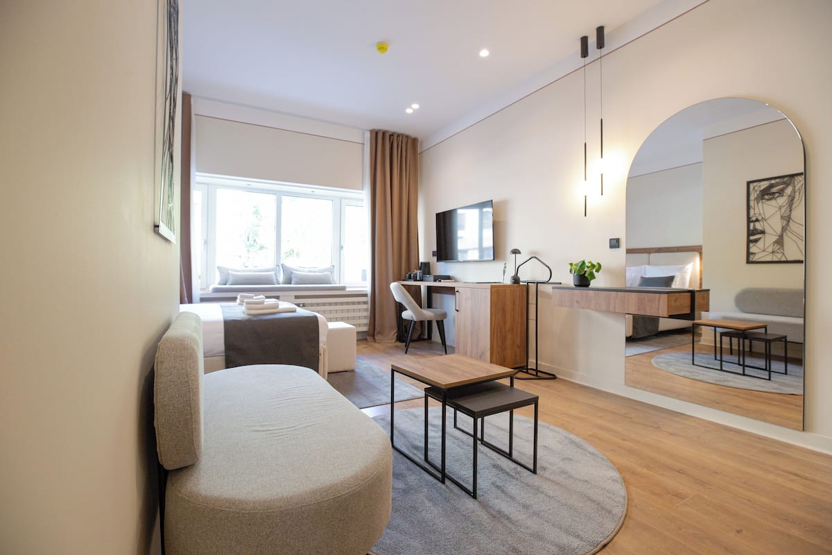 Superior kamer, 1 twee- of 2 eenpersoonsbedden | Een kluis op de kamer, een bureau, verduisterende gordijnen