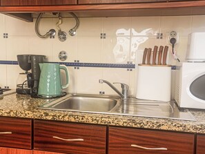 Fridge, microwave, oven, cookware/dishes/utensils