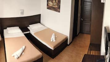 Habitación Deluxe | Camas extra, wifi gratis y ropa de cama