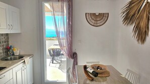 Family House, Sea View, Beachfront | Private kitchen | Fridge, stovetop, espresso maker, electric kettle - Mykonos4Islands Seaside Homes and Suites (Mykonos)