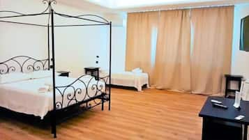 Standard Quadruple Room | In-room safe, desk, free WiFi