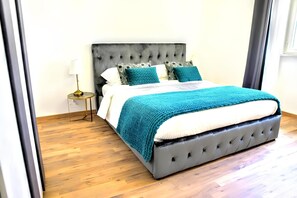 1 bedroom, desk, iron/ironing board, travel cot