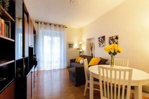 Classic Apartment, Balcony | Living area | Smart TV