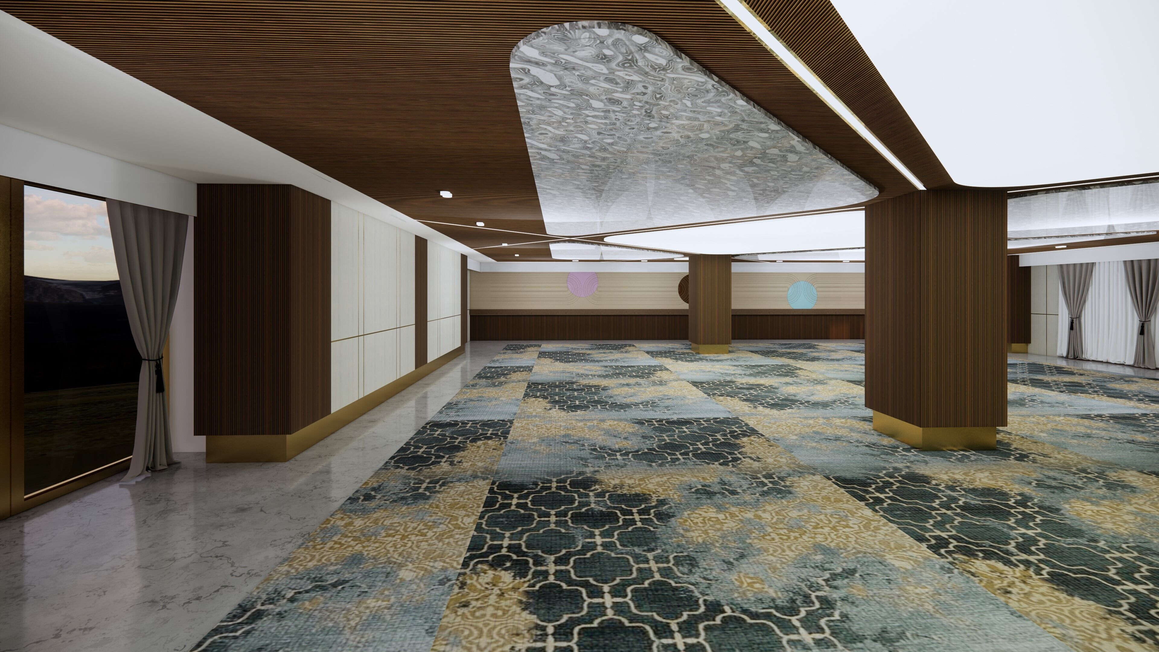 Un amplio vestíbulo de hotel con alfombra estampada, paneles de madera y un elemento decorativo grande en el techo.