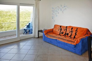 Deluxe Apartment, 3 Bedrooms | Living room - Apartment in Golfo Aranci With Terrace (Arzachena)