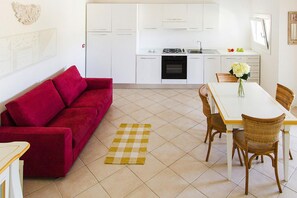 Classic Apartment, 4 Bedrooms | Living room - Apartment in Golfo Aranci With Terrace (Arzachena)