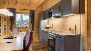 Deluxe Chalet, 5 Bedrooms | Private kitchen | Fridge, microwave, oven, dishwasher