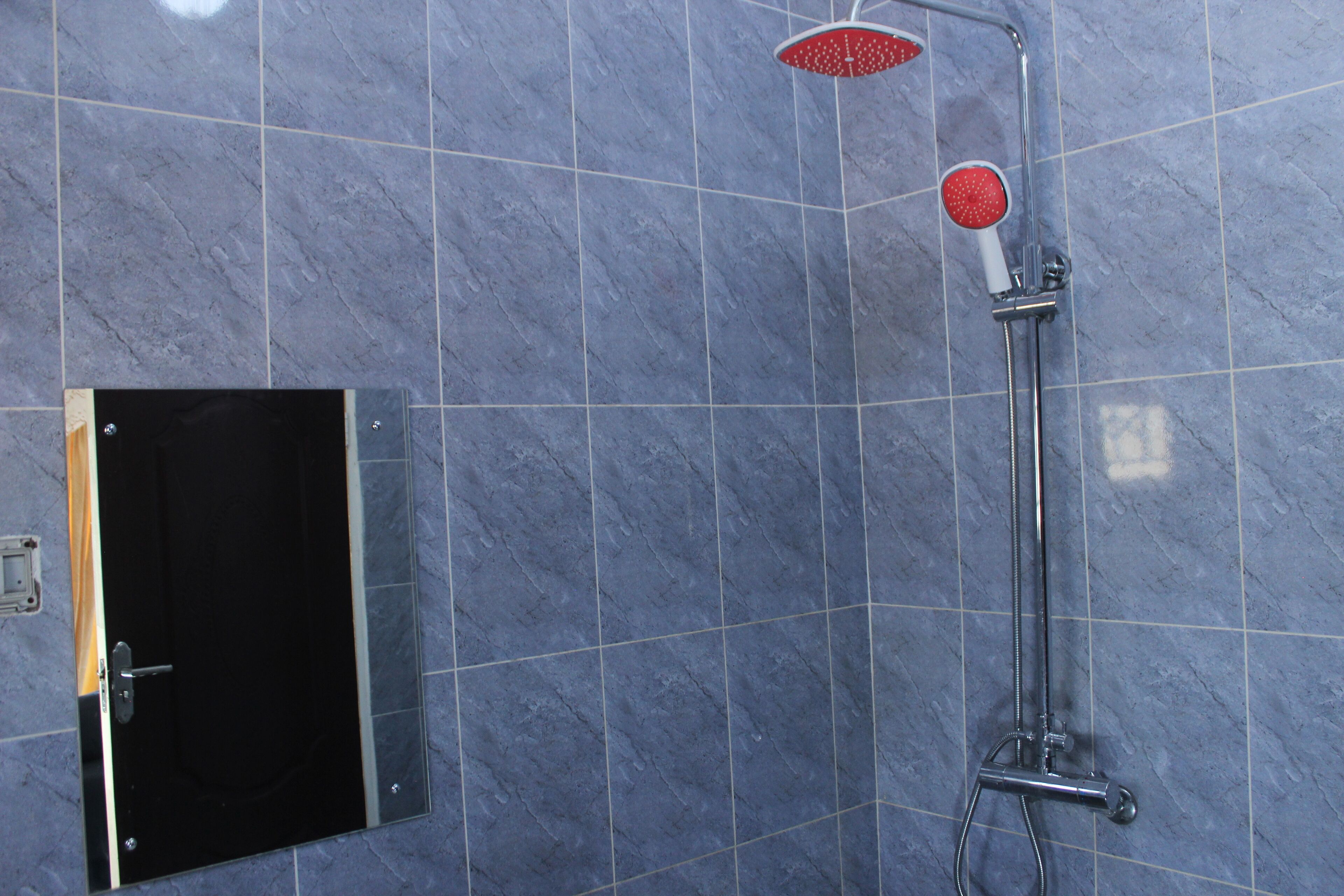 Shower, towels, soap, toilet paper