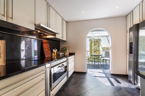 Fridge, microwave, oven, stovetop - VILLA LA ROSERAIE VI4425 By Riviera Holiday Homes (Mougins)