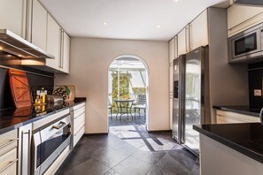 Fridge, microwave, oven, stovetop - VILLA LA ROSERAIE VI4425 By Riviera Holiday Homes (Mougins)