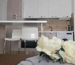 Apartamento família | 1 quarto, ferros/tábuas de passar roupa, Wi-Fi de cortesia