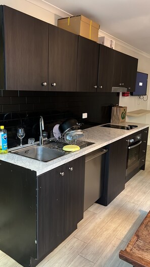 Gazdaságos apartman, erkély | Nappalirész
