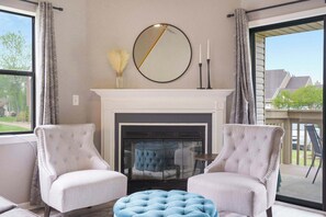 TV, fireplace, books, offices