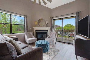 TV, fireplace, books, offices