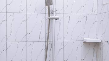 Shower, free toiletries, towels, soap