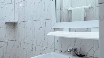 Classic Double Room, Balcony, City View | Bathroom | Shower, free toiletries, towels, soap