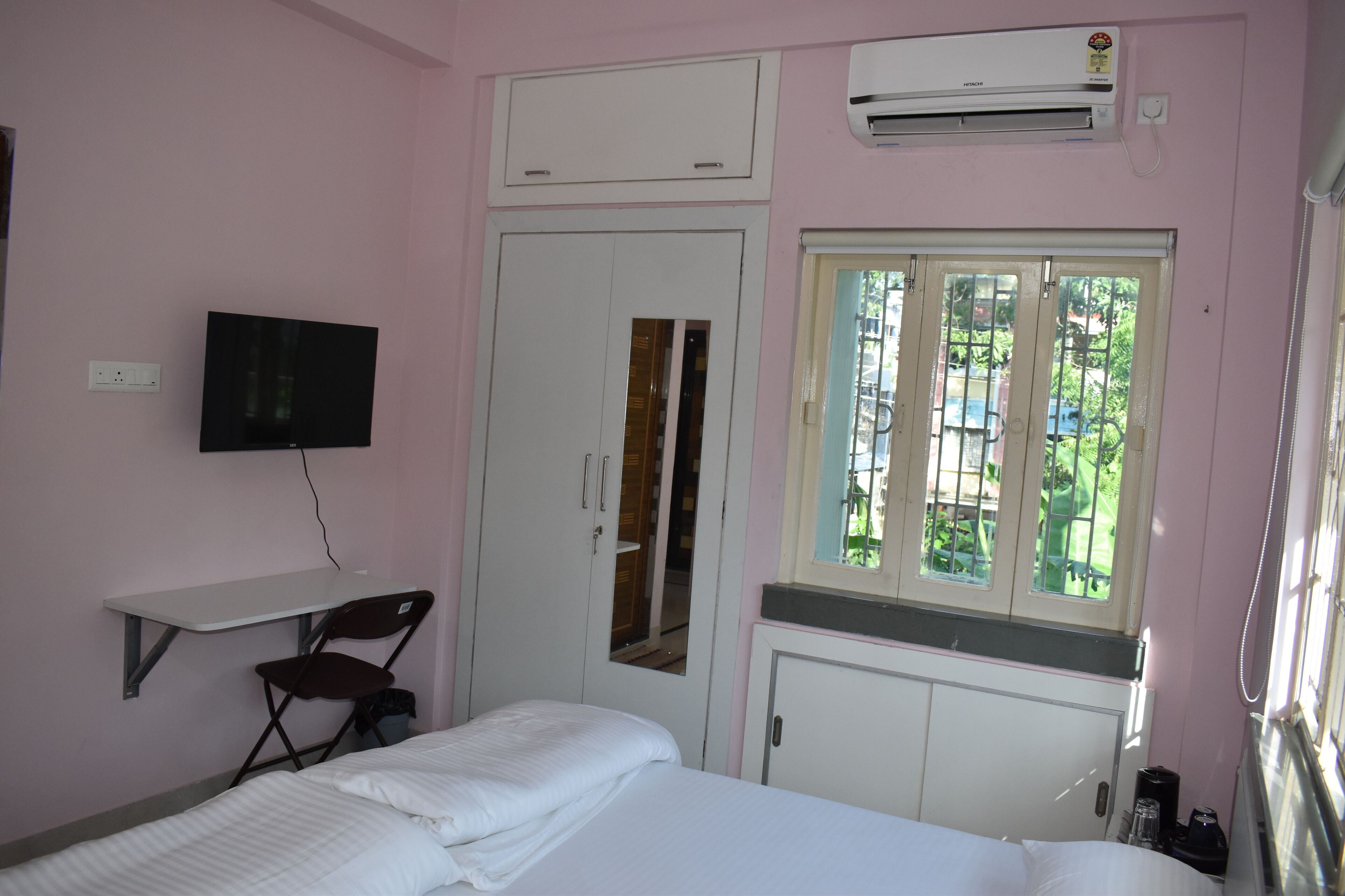 Family Double Room, Balcony, City View | Desk, laptop workspace