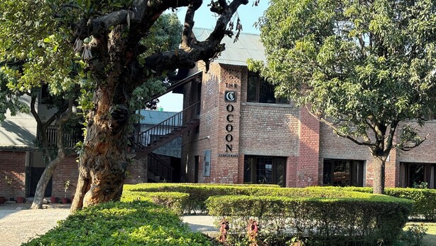 A brick building with a sign reading "The OCOON."