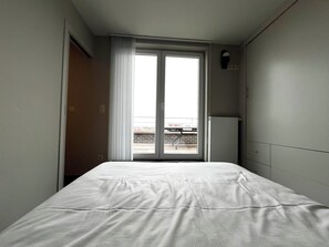 1 slaapkamer, een strijkplank/strijkijzer, wifi