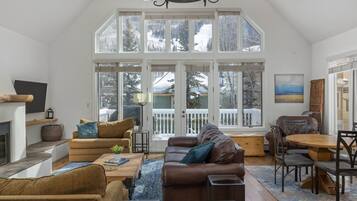 Smart TV, fireplace, books, offices