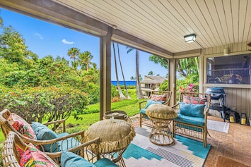 Ocean-view lanai with comfy seating at Wailea Ekolu 1605 – perfect Maui relaxation.