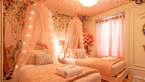 A bedroom with two beds, each with a canopy, and a large window with curtains. - Last Minute Disney Getaway! Private Pool & Game Room. Book Now! #121741 (Orlando)