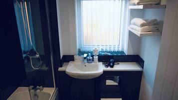 Hair dryer, towels, soap, toilet paper