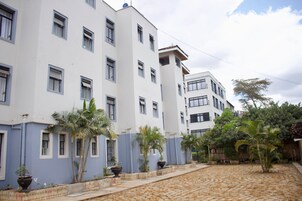 A multi-story building with a courtyard.