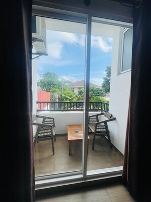 Luxury Double Room, Balcony, City View | Living area | TV - Lucky Transit Hotel (Seeduwa)