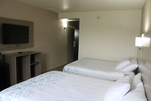 Room, 2 Queen Beds | Individually furnished, desk, free WiFi, bed sheets