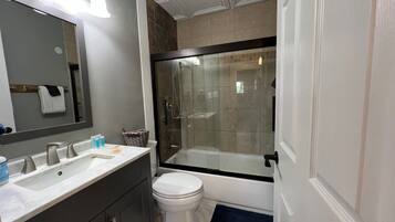 Shower, hair dryer, towels