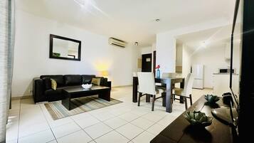 Apartamento | Área de estar | TV