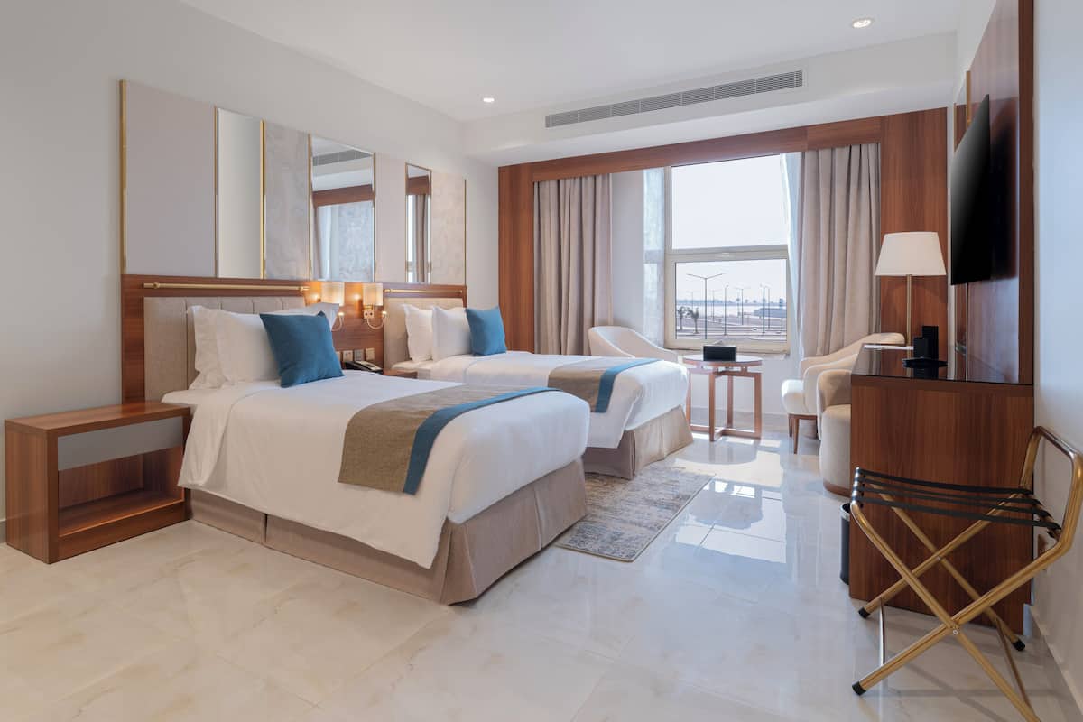 Habitación estándar con 2 camas individuales, vista al mar | 1 habitación y ropa de cama de alta calidad